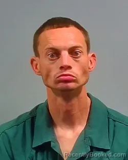 Mugshot of Devin Sean Creech booked in Escambia County, Florida on October 14, 2026