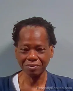 Mugshot of Angela Denise Moore booked in Escambia County, Florida on October 16, 2026