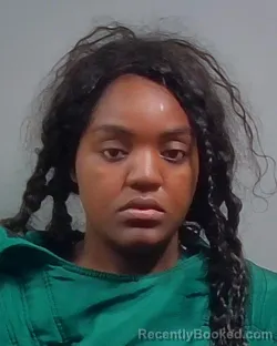 Mugshot of Dasha Monique Tucker booked in Escambia County, Florida on October 16, 2026