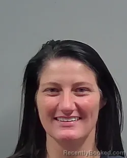 Mugshot of Julia Nicole Buttram booked in Escambia County, Florida on October 21, 2026