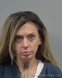 Mugshot of Erin Danielle Delane Mcneely booked in Escambia County, Florida on October 21, 2026