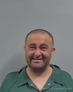 Mugshot of Thomas Dane Harrell booked in Escambia County, Florida on October 21, 2026
