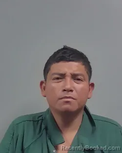 Mugshot of Carlos Alberto Alegria Agustin booked in Escambia County, Florida on October 26, 2026