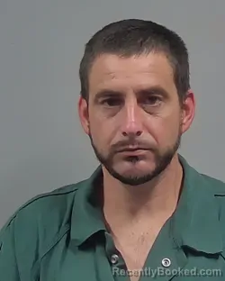 Mugshot of Eric Joseph Breton booked in Escambia County, Florida on October 26, 2026