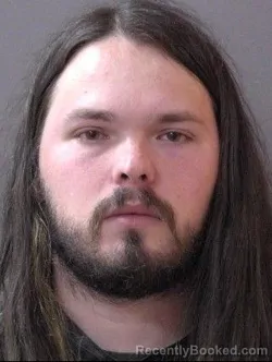 Mugshot of Logan Keith Crum booked in Hamilton County, Indiana on April 5, 2026