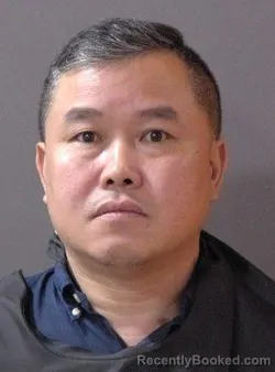 Mugshot of Ming Guan booked in Hamilton County, Indiana on July 21, 2026