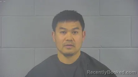 Mugshot of RESA NMI PHETSOMPHOU booked in Hancock County, Indiana on March 18, 2026