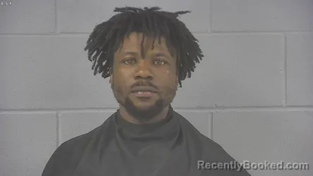 Mugshot of ELIA NMI KALAMBA booked in Hancock County, Indiana on May 24, 2026