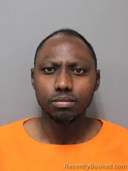 Mugshot of JUSTIN BYIRINGINO