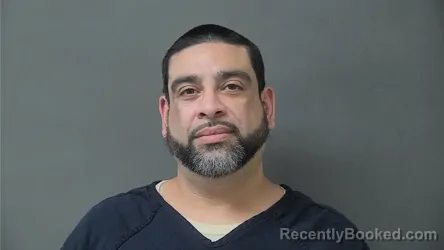 Mugshot of XAVIER ALBERTO SANTIAGO