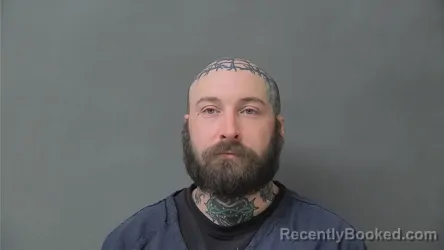 Mugshot of MICHAEL IAN CONRAD-WOLFF booked in Howard County, Indiana on May 6, 2026