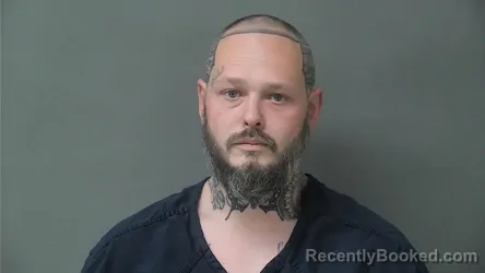 Mugshot of ZANE EDWARD HOLLOMAN booked in Howard County, Indiana on May 14, 2026