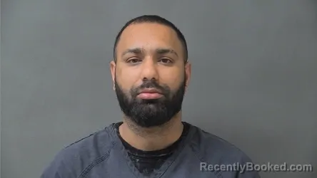Mugshot of Harkirai Nmi Singh booked in Howard County, Indiana on August 13, 2026
