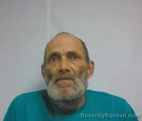 Mugshot of TOM HUCKABEE