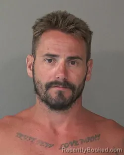 Mugshot of JORDAN MICHAEL ROUTSON