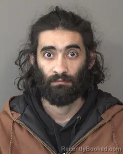 Mugshot of ZENAL ABDEEN IBRAHIM AL SOUDANI