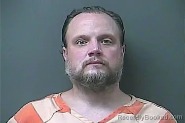 Mugshot of Justin Tennant booked in La Porte County, Indiana on August 9, 2026