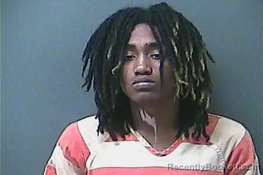 Mugshot of O'MAR GUZMAN booked in La Porte County, Indiana on April 28, 2026