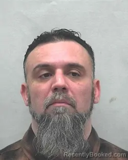 Mugshot of MANDO W FLORES