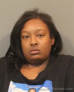 Mugshot of Ashley Dominique Taylor booked in Lake County, Indiana on September 9, 2026