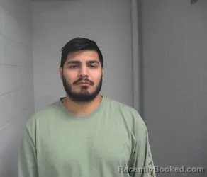 Mugshot of Andres Candelario Santos booked in Lake County, Indiana on August 26, 2026