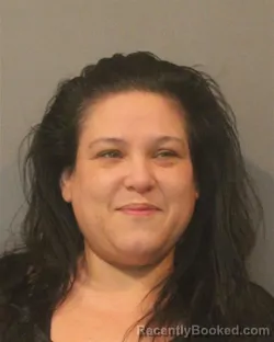 Mugshot of NATALIE RENI ROMO booked in Lake County, Indiana on April 30, 2026