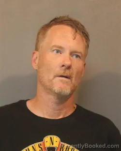 Mugshot of JUSTIN MARTIN LESNIEWSKI