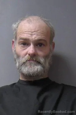 Mugshot of Richard M Woods