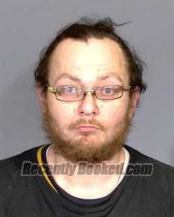 Mugshot of SEAN RICHARD EVANS booked in Marion County, Indiana on April 12, 2026
