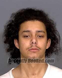 Mugshot of TAHMIR ACOFFI COGHILL booked in Marion County, Indiana on April 1, 2026