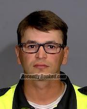 Mugshot of Jonathan Winston Becker booked in Marion County, Indiana on October 7, 2026
