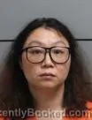 Mugshot of ANXIN QIU booked in Marshall County, Indiana on June 16, 2026
