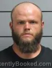 Mugshot of Travis Dean Maclain booked in Marshall County, Indiana on August 26, 2026