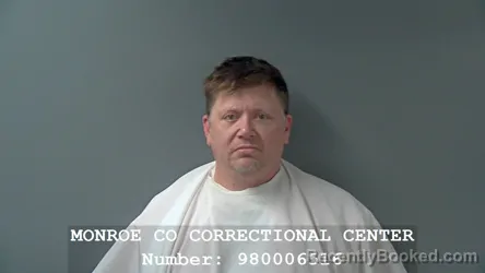 Mugshot of SAMUEL H WOODS