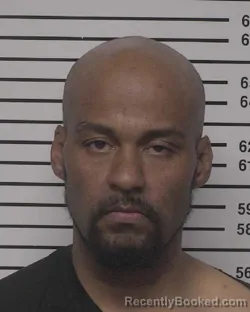 Mugshot of CHRISTOPHER TRAVIS HELMIC booked in Iredell County, North Carolina on March 24, 2026