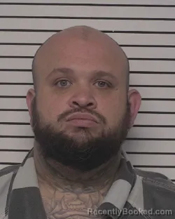 Mugshot of BRANDON SHAUN RHODES booked in Iredell County, North Carolina on March 30, 2026