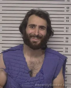 Mugshot of CYRUS WALKER HOMSLEY booked in Iredell County, North Carolina on March 18, 2026