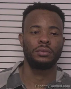 Mugshot of CALEB OBINNA ENYINNAYA booked in Iredell County, North Carolina on March 12, 2026