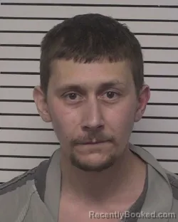 Mugshot of ADAM MICHAEL PACKARD booked in Iredell County, North Carolina on March 27, 2026