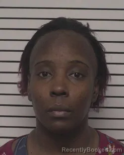 Mugshot of CORA BROWN TATE booked in Iredell County, North Carolina on April 22, 2026