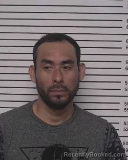 Mugshot of OSCAR BRIONES ALEJANDRO-MENDEZ booked in Iredell County, North Carolina on July 5, 2026