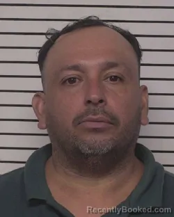 Mugshot of CESAR ALBERTO ESPINAL booked in Iredell County, North Carolina on July 18, 2026