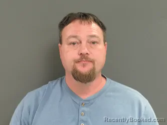 Mugshot of MATTHEW J REYNOLDS