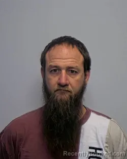 Mugshot of Justyn Edward Strunk booked in Porter County, Indiana on May 12, 2026