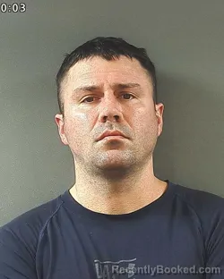Mugshot of Brett Colin Bowers booked in Posey County, Indiana on August 29, 2026