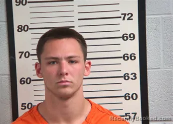 Mugshot of AUSTIN LEE CUNNINGHAM booked in Jackson County, North Carolina on March 24, 2026