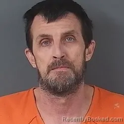 Mugshot of Carl Raymon Riker