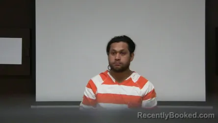 Mugshot of Julio Cesar Guzman Bello booked in Rush County, Indiana on April 6, 2026