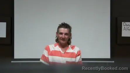 Mugshot of George R Collins booked in Rush County, Indiana on April 16, 2026