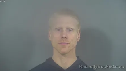 Mugshot of AUSTIN WARD KINDER